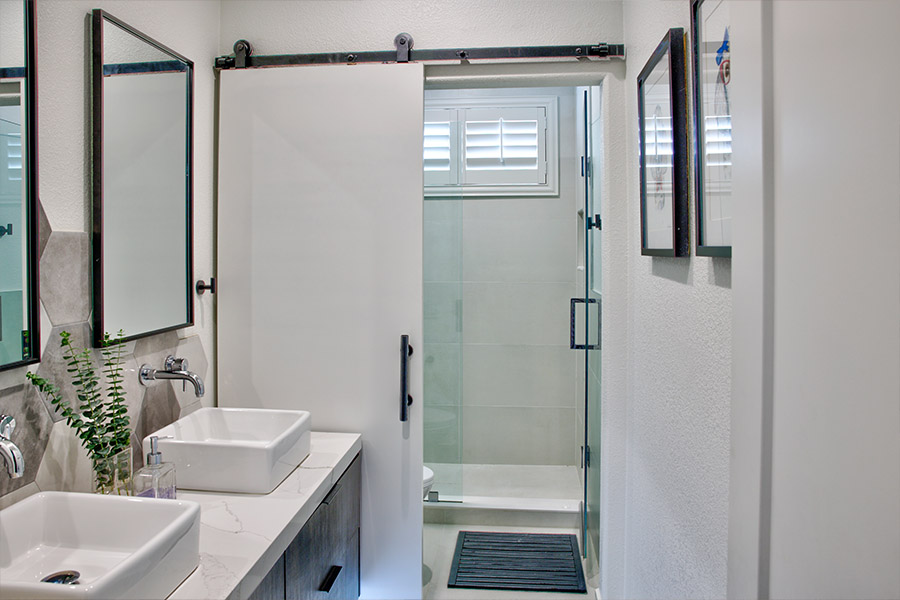 Polywood shutters on a basement shower window